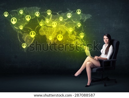 Businesswoman in office with laptop and social network world map concept on background
