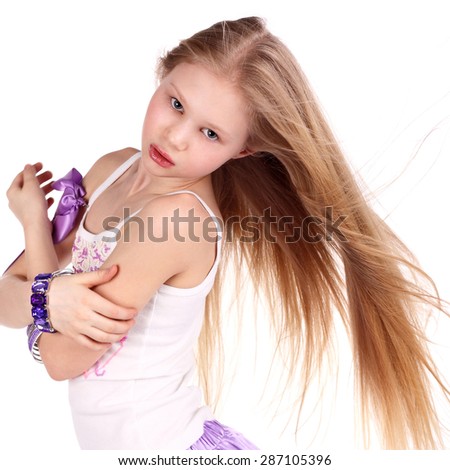 closeup image of a dancing beautiful blonde teenage girl 