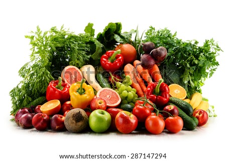 Variety of organic vegetables and fruits isolated on white background