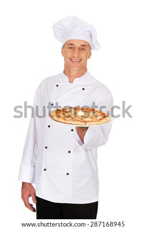 Chef baker with italian pizza on plate.