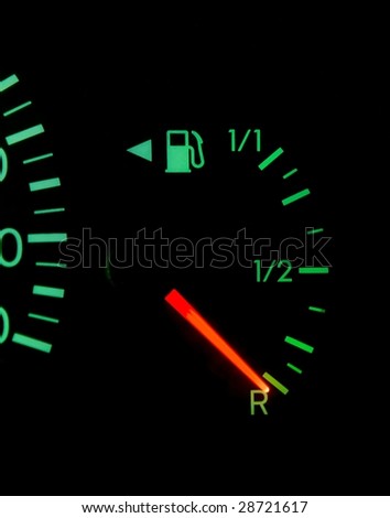 Dashboard showing fuel running out Royalty-Free Stock Photo #28721617