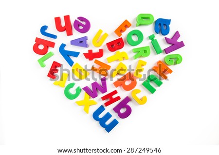 Love to learn. Heart shape made of colorful magnetic fridge letters.