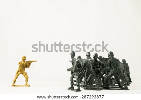 Plastic Lead Soldiers Representing War on a White Background Royalty-Free Stock Photo #287293877
