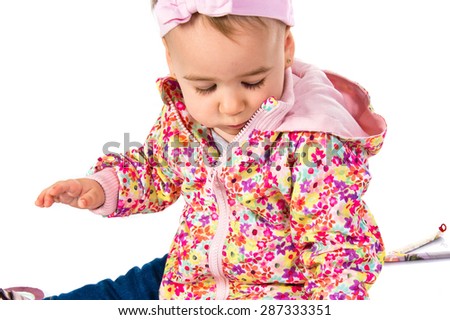 Baby playing with letters 