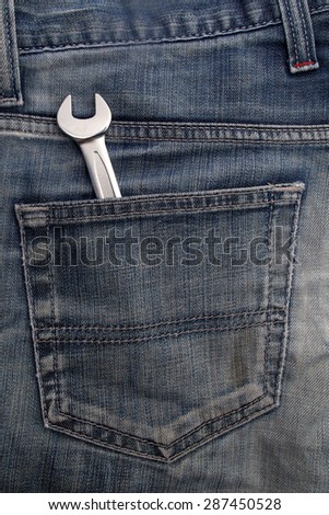 wrench in the back jeans pocket, vintage color