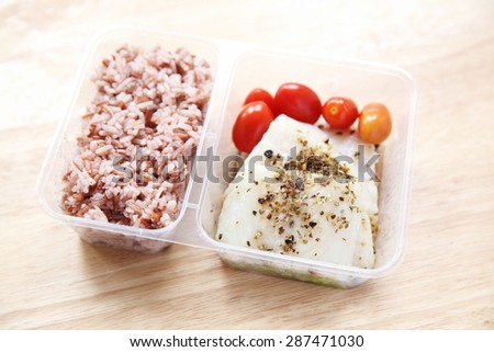 Clean food Fish steak with rice in bento