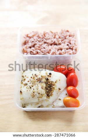 Clean food Fish steak with rice in bento