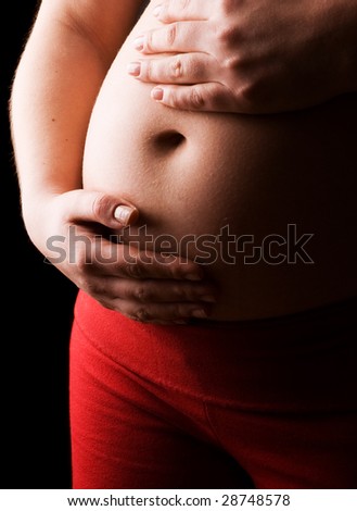 Pregnant Woman holding her Belly