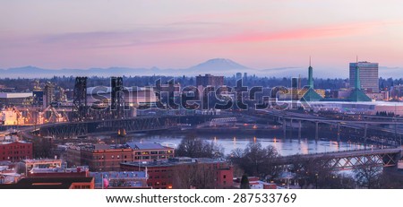 Portland Oregon Cityscape at Sunrise with Mt St Helens View along Willamette River Panorama Royalty-Free Stock Photo #287533769