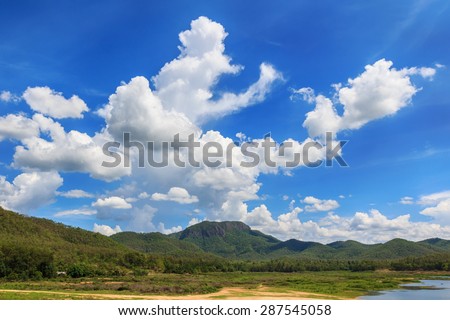 Mountain and clouds with blue sky