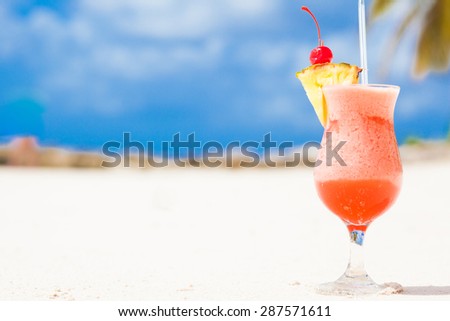 picture of fresh fruit cocktail on tropical beach