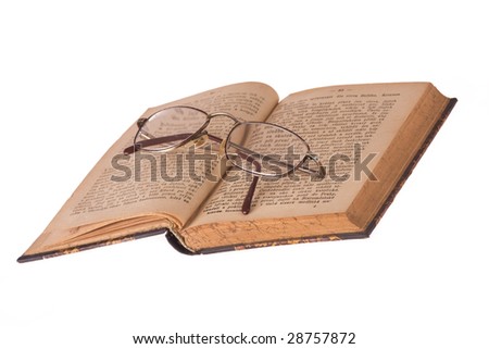 vintage glasses and old book
