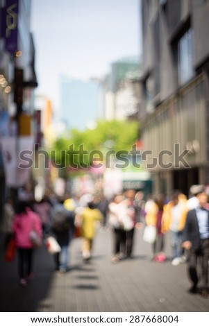 Defocused Busy Street of the Shopping District Myeong-dong, Seoul, South Korea