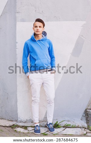 Handsome young man portrait outdoors
