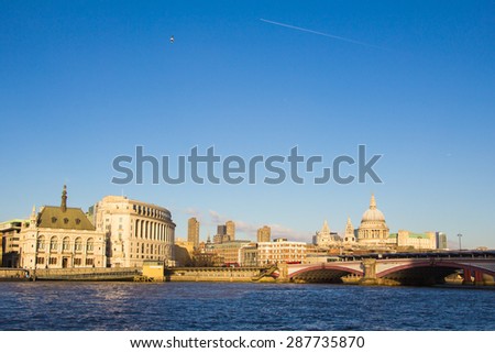 River Thames in London, the view to the north shore and the Cathedral of St. Paul.