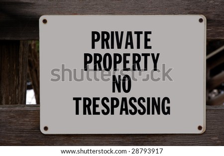 "Private Property No Trespassing" sign.