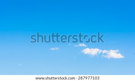 image of clear sky with white clouds on day time for background usage .