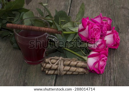 bouquet of pink roses and tea with cookies, the image of drinks, a still life