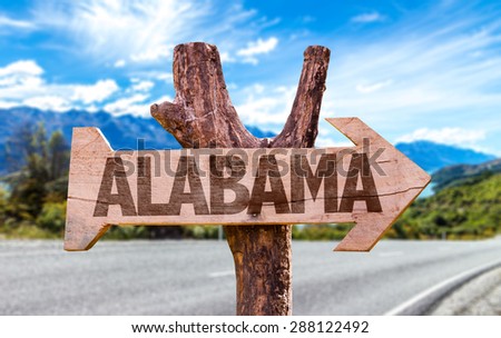 Alabama wooden sign with road background