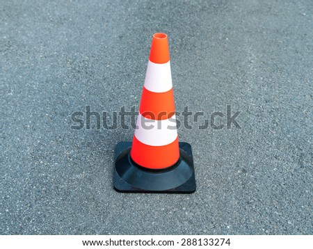 Road bollard traffic cone road on asphalt