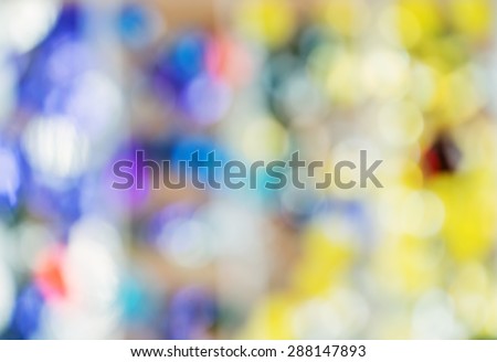 Beautiful abstract bokeh surface multicolored sparkles defocused on the background
