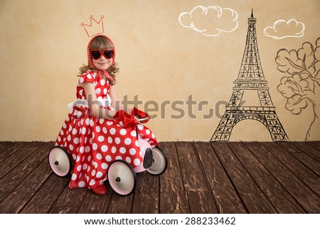 Happy child playing at home. Car trip. Summer vacation and travel concept