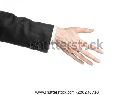 Businessman and gesture topic: a man in a black suit and white shirt showing hand gesture on an isolated white background in studio