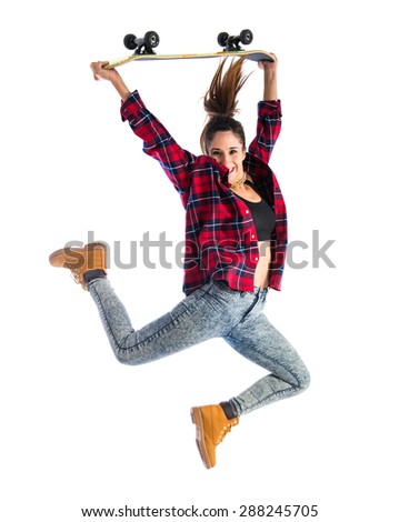 Happy woman jumping with skate