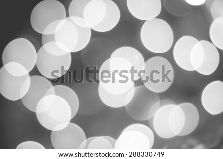 Abstract Black and White bokeh backround of happy new year or christmas light