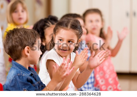 Preschoolers playing in classroom. Royalty-Free Stock Photo #288364628