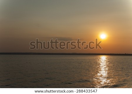 beautiful picture showing a sunset over lake Siutghiol