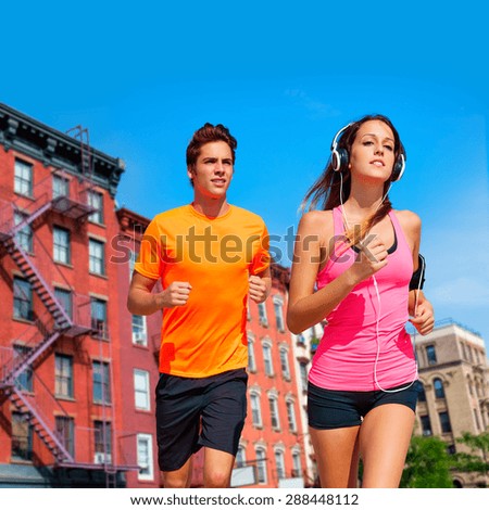 Couple running in New York city photo mount in pink and orange colors