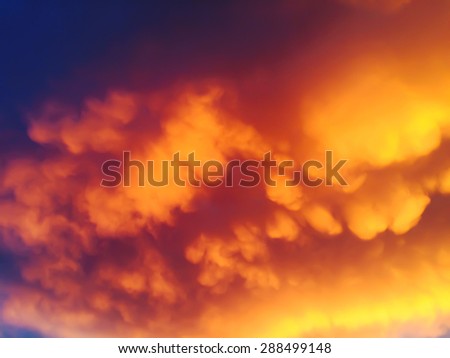 Blurred Orange clouds background.