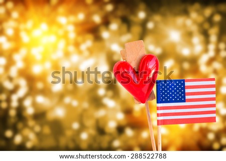 American flag and heart on defocused bokeh lights background for 4th,july