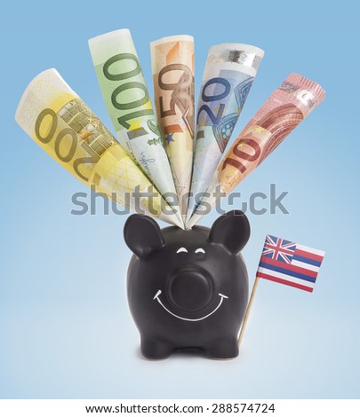 Ten,twenty,fifty,one hundred and a 200 Euro banknote in a smiling piggybank of Hawaii.(series)