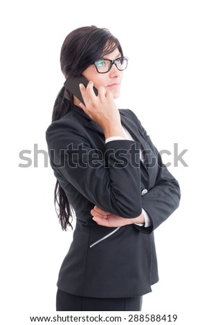 Busy and modern saleswoman talking on smartphone while looking up isolated on white background
