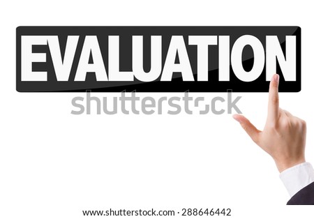 Businessman pressing button with the text: Evaluation