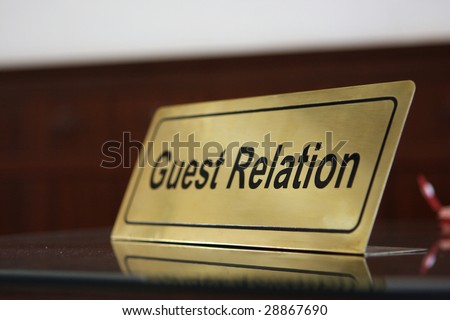 Close Guest relation tablet on reception desk