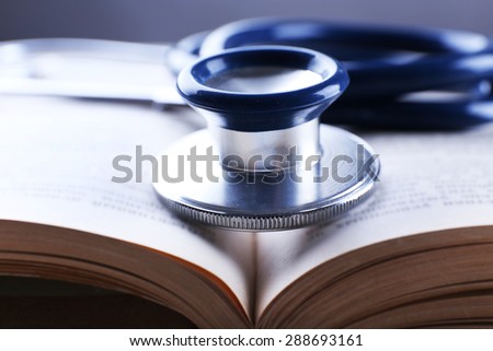 Stethoscope on book, closeup
