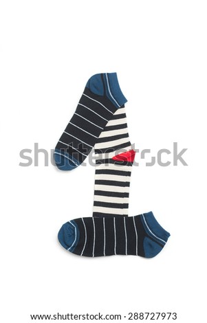 Number one made from colourful socks. Different socks isolated on white. 