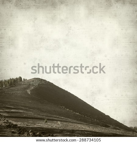 textured old paper background with landscape of Gran Canaria
