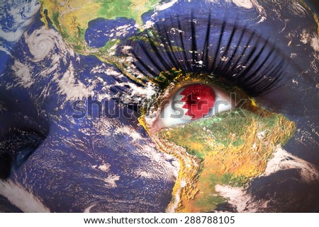 womans face with planet Earth texture and bahrain flag inside the eye. Elements of this image furnished by NASA.