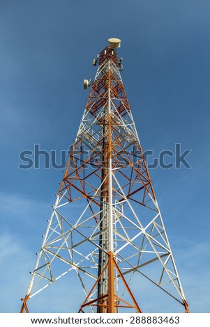 communication towers on blue sky background