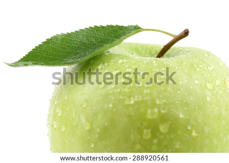Closeup macro green apple fruit with leaf isolated on a white background