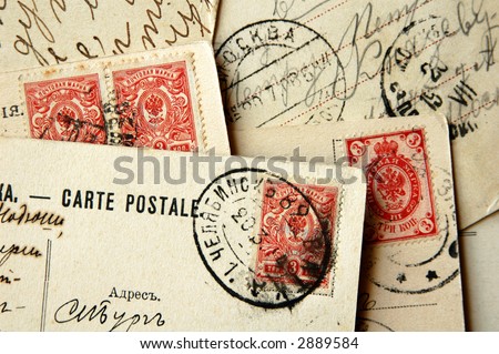 Old Russian postcards with two-headed eagles in the stamps