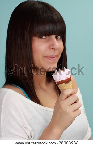 Cute girl holding an ice cream cone, blue background