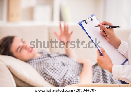 Psychologist having session with her patient in her private consulting room. Royalty-Free Stock Photo #289044989