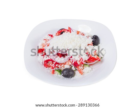 Fresh vegetable salad with grated cheese. Isolated on a white background.