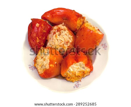 Stuffed with red peppers on a plate. Isolated on white background