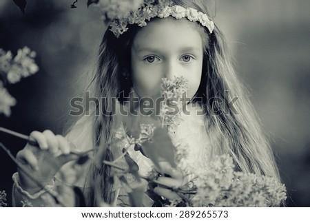 girl collects flowers childhood